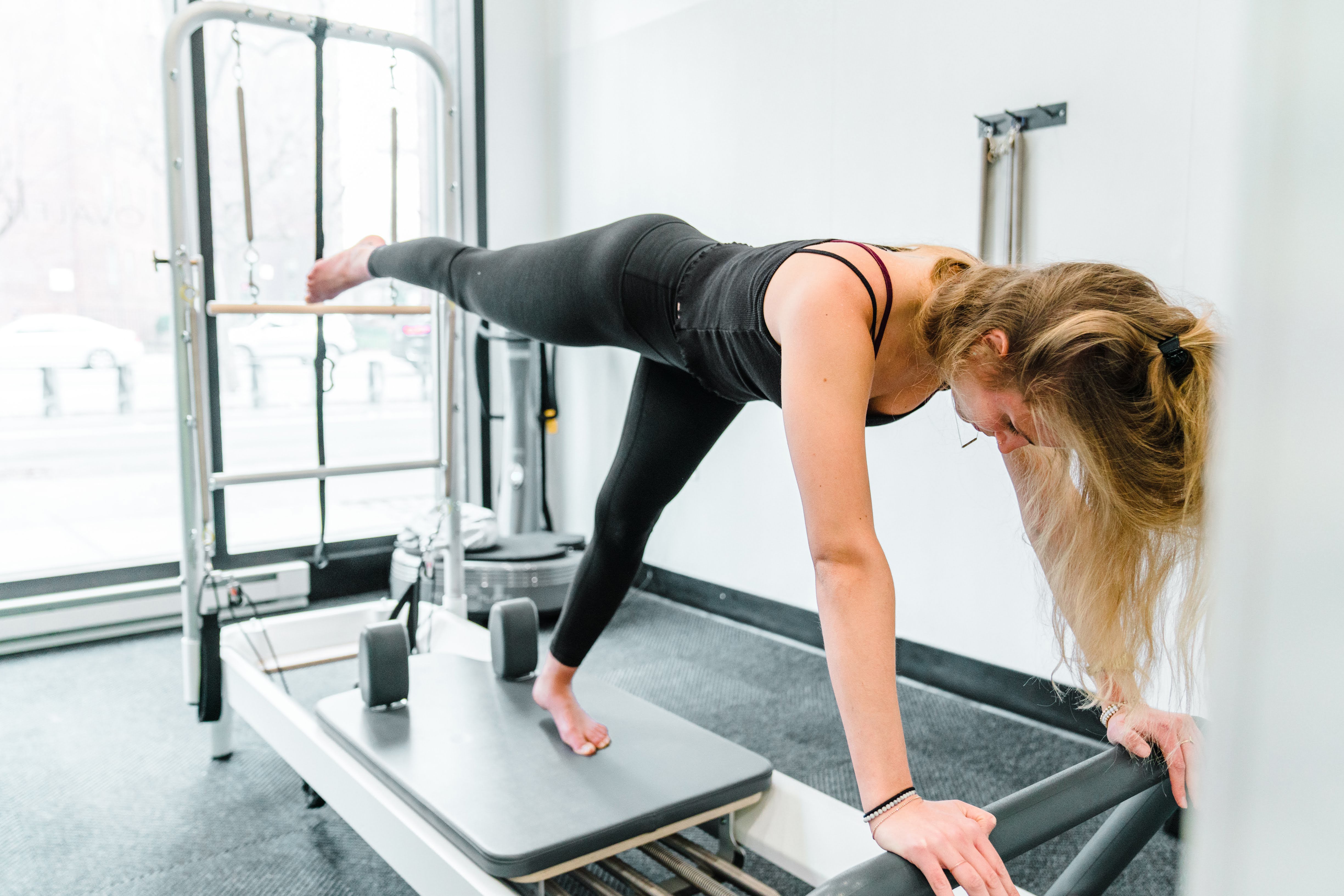 Girl on Pilates Reformer