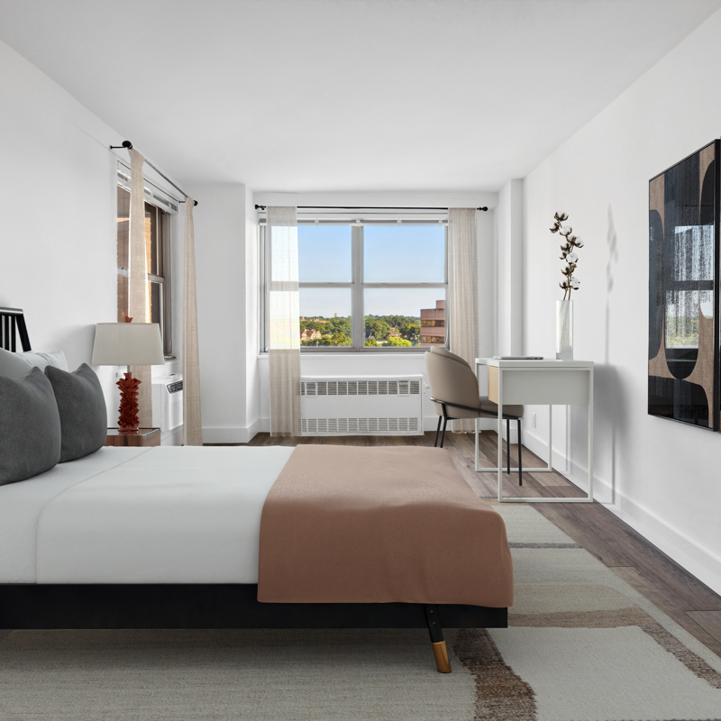 Bedroom with window, desk, white and gray bedding