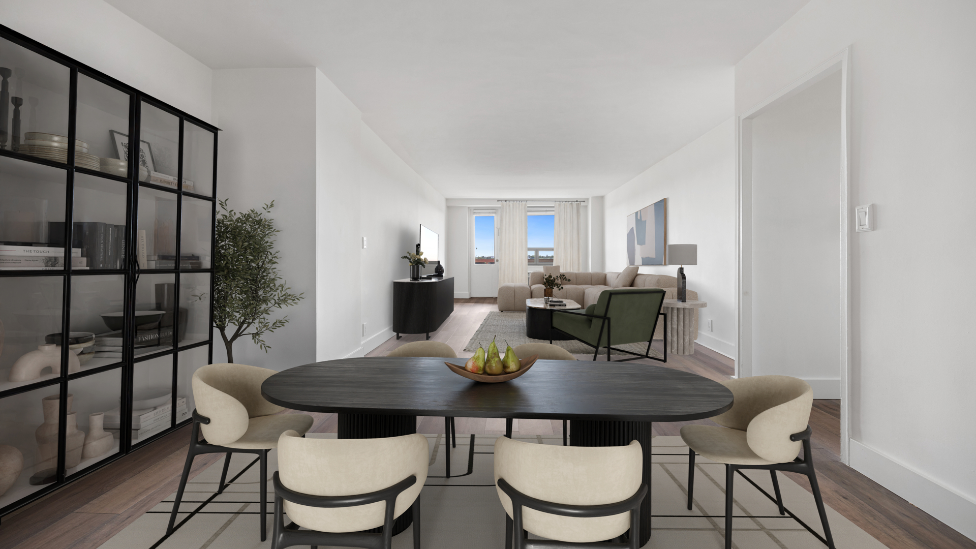 Dining Room with Dark Wood Table, Bookcase, Living Room in back