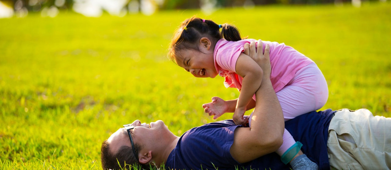 Family Man and Child on grass